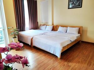 Postel nebo postele na pokoji v ubytování Thảo Nguyên