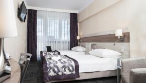 Posteľ alebo postele v izbe v ubytovaní Comfort by Trio