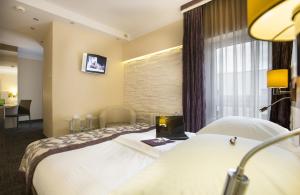 Posteľ alebo postele v izbe v ubytovaní Comfort by Trio