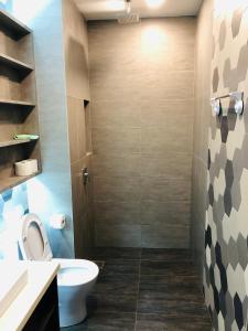 Koupelna v ubytování Ceylonz Suites by ROOMY