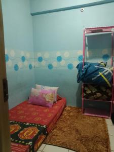 Tempat tidur dalam kamar di Polan property