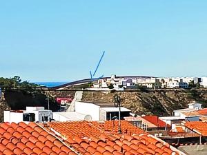 a view of an orange roof of a city at Bonito Departamento Confortable in Tijuana