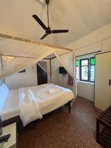 Postel nebo postele na pokoji v ubytování Ocean View Goan Beach House