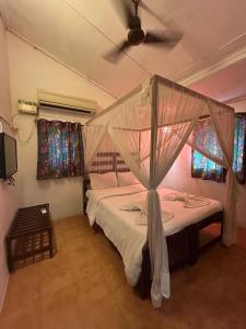 Postel nebo postele na pokoji v ubytování Ocean View Goan Beach House