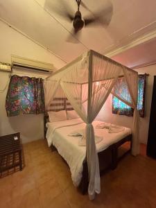 Postel nebo postele na pokoji v ubytování Ocean View Goan Beach House