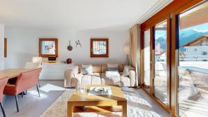 Posezení v ubytování Family holiday home Tgiampi Sot Lantsch Lenzerheide + 18 fotografií