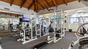 a gym with treadmills and elliptical machines at Beautiful newly remodeled 2-Bdrm Biltmore Condo in Phoenix