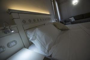 Letto o letti in una camera di Hotel Sesmones