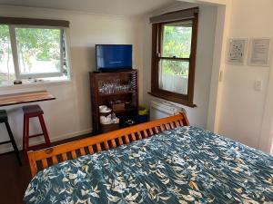 Bellingen Treehouse客房内的一张或多张床位