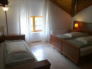 Postel nebo postele na pokoji v ubytování Albergo Miravalle