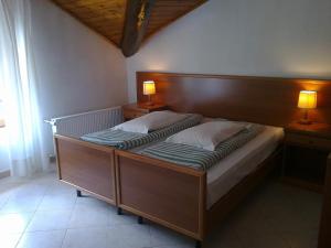 Postel nebo postele na pokoji v ubytování Albergo Miravalle