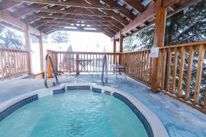 a pool on the deck of a house at Red Shutter Inn in Rossland