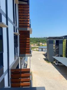 a view of the balcony of a building at Green Valley Bliss in Boschrand