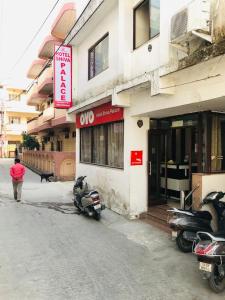 a group of motorcycles parked outside of a building at Hotel Best stay haridwar by Shiva Palace in Haridwār
