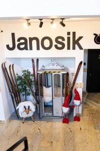 a store with a japanisk sign and skis on display at Pensjonat Janosik in Zakopane