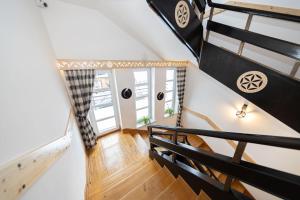 a view of a staircase in a house at Pensjonat Janosik in Zakopane