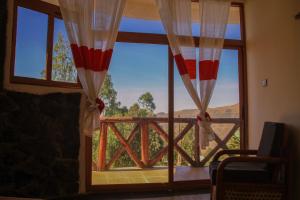 a room with a window with a view at Lalibela Hidmo Cozy Place in Lalibela