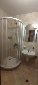 a bathroom with a shower and a sink at Apartment SUNNY&RELAX Pamporovo The Castle 2 in Pamporovo +34 photos