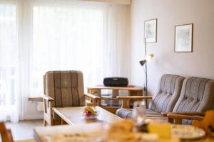 Posezení v ubytování Brentschpark Wohnung C 96