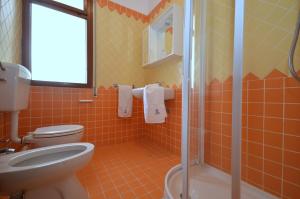 Fotografie z fotogalerie ubytování Villaggio Alex v Lignanu Sabbiadoru + 36 fotografií