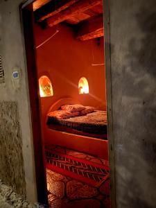 a room with an oven with a bed in it at Santarya hotel in Siwa