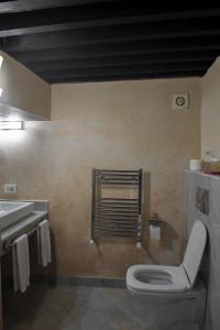 a bathroom with a toilet and a sink at Riad Palais Bahia Fes in Fez