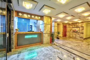 a lobby with a television in a building at North Blue Life in Istanbul