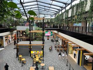 an overhead view of a shopping mall with people walking in it at Cozy stylish home in Rhodes in Sydney