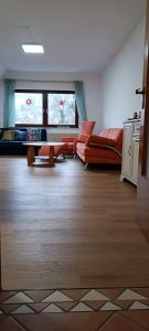 Posezení v ubytování Apartment with panoramic views in the black forest
