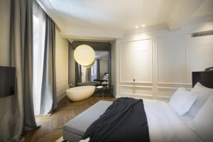 Posteľ alebo postele v izbe v ubytovaní Adriatic Hotel by Maistra Collection