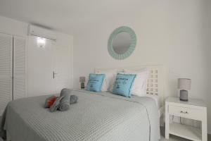 Postel nebo postele na pokoji v ubytování Plage Baie Orientale - Villa 6p Piscine privée