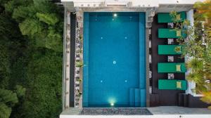 an overhead view of a swimming pool in a building at The Community - Siem Reap in Siem Reap