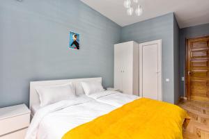 Postel nebo postele na pokoji v ubytování Sunny Hotel Tbilisi