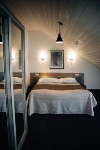 Postel nebo postele na pokoji v ubytování VILSON hotel + 37 fotografií