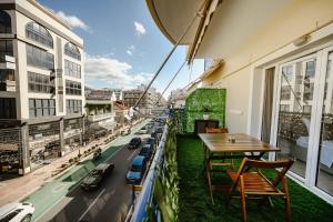 A balcony or terrace at Central Apartments City Center