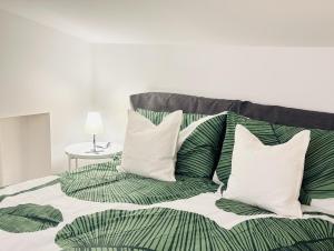 Säng eller sängar i ett rum på PM 26 Via Riccardo Morbelli Guest House