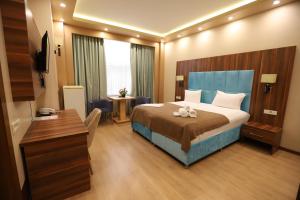 Postel nebo postele na pokoji v ubytování GREEN PARK HOTEl + 27 fotografií