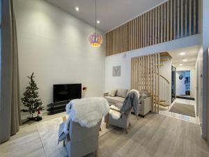 Posezení v ubytování Nordic Wooden House