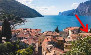 a view of a town next to a body of water at Vida Boa - Holiday Residence in Nago-Torbole