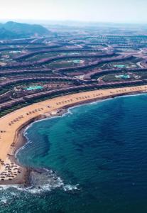an aerial view of a beach and the ocean at Telal sokhna villa families only in Ain Sokhna