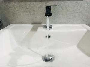 Koupelna v ubytování Lora Homestay
