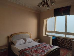 Postel nebo postele na pokoji v ubytování Elkhaima motel