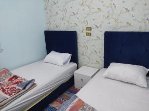 Postel nebo postele na pokoji v ubytování Elkhaima motel