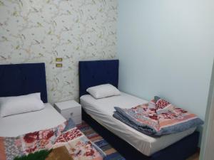Postel nebo postele na pokoji v ubytování Elkhaima motel