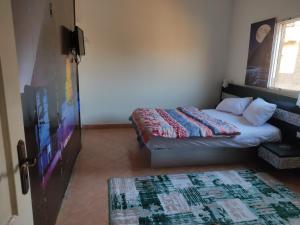 Postel nebo postele na pokoji v ubytování Elkhaima motel