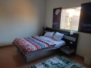 Postel nebo postele na pokoji v ubytování Elkhaima motel