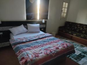 Postel nebo postele na pokoji v ubytování Elkhaima motel