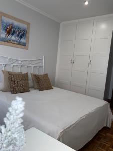 A bed or beds in a room at A CALZADA