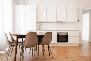 Kuchyň nebo kuchyňský kout v ubytování HeyMi Apartments Zentagasse