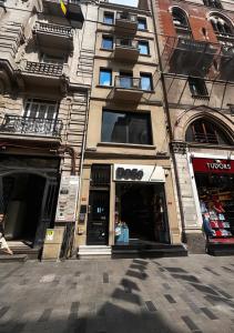 a store on a street in front of a building at Magnova Studios in Istanbul